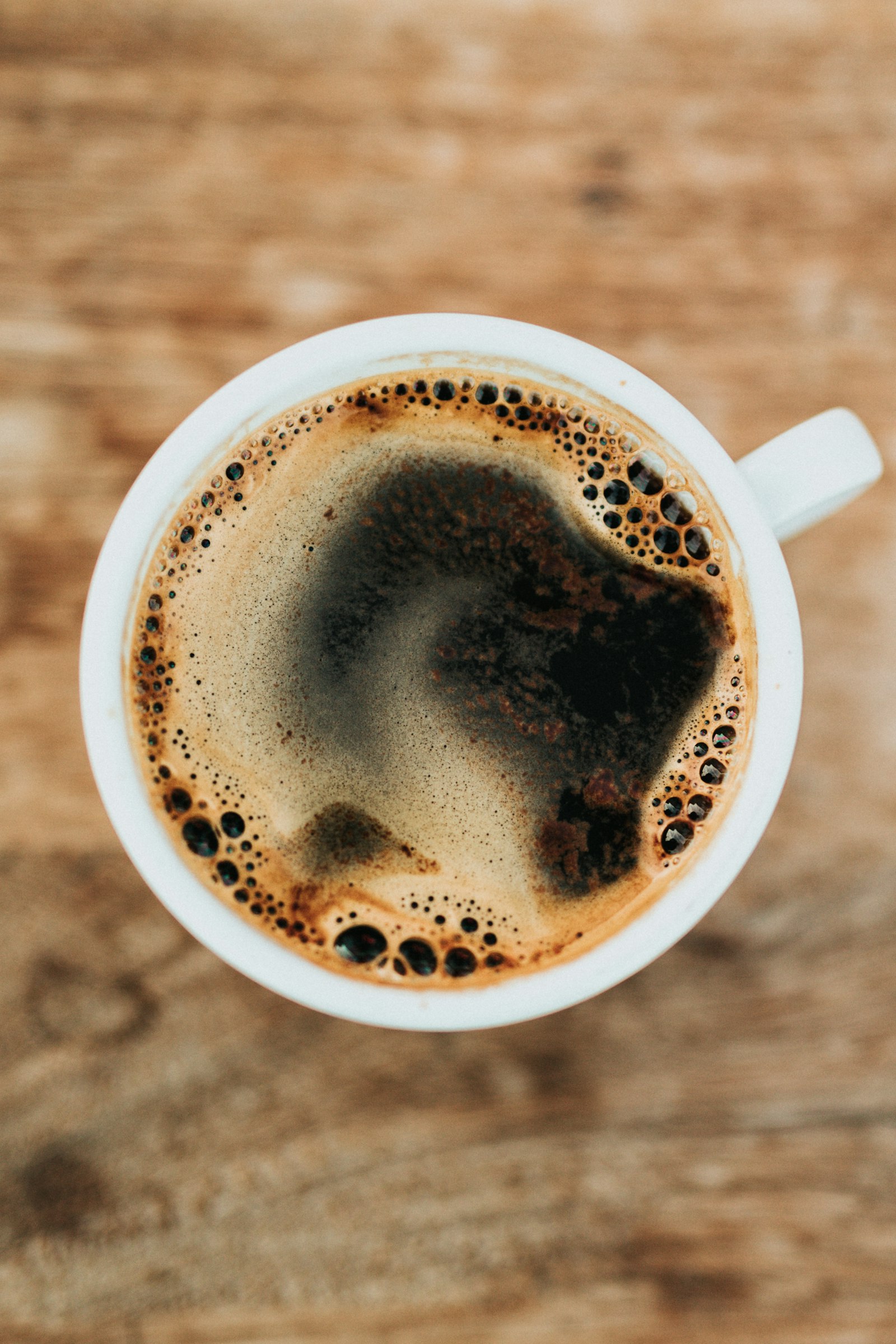 Warm, glowing cup of coffee being brewed