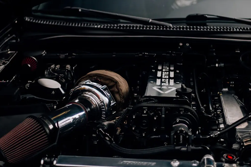 Modified engine bay during a diagnostic and tune inspection